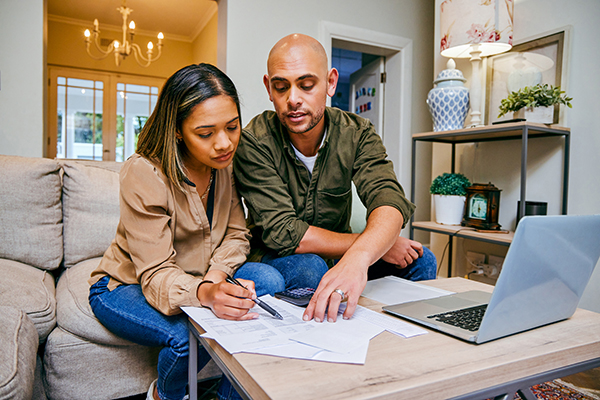 Couple discussing their finances, Getty