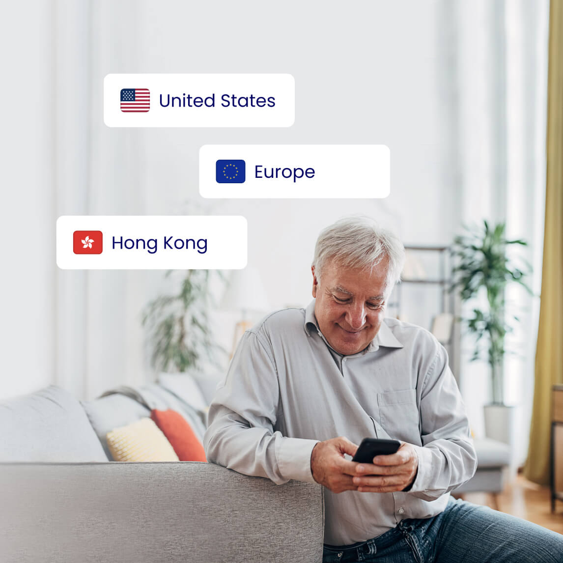 senior man looking at international investments on device