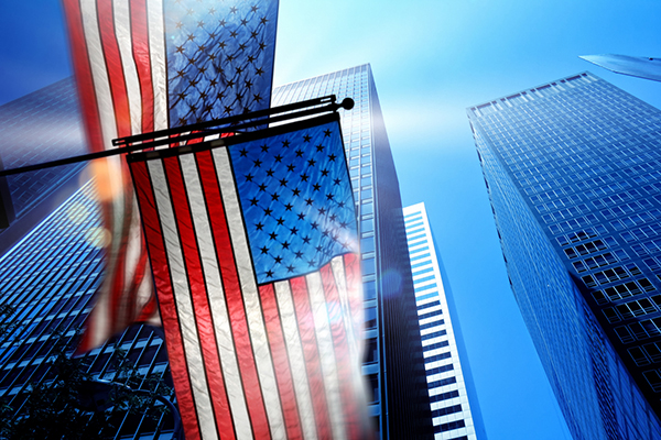 American flags and skyscrapers