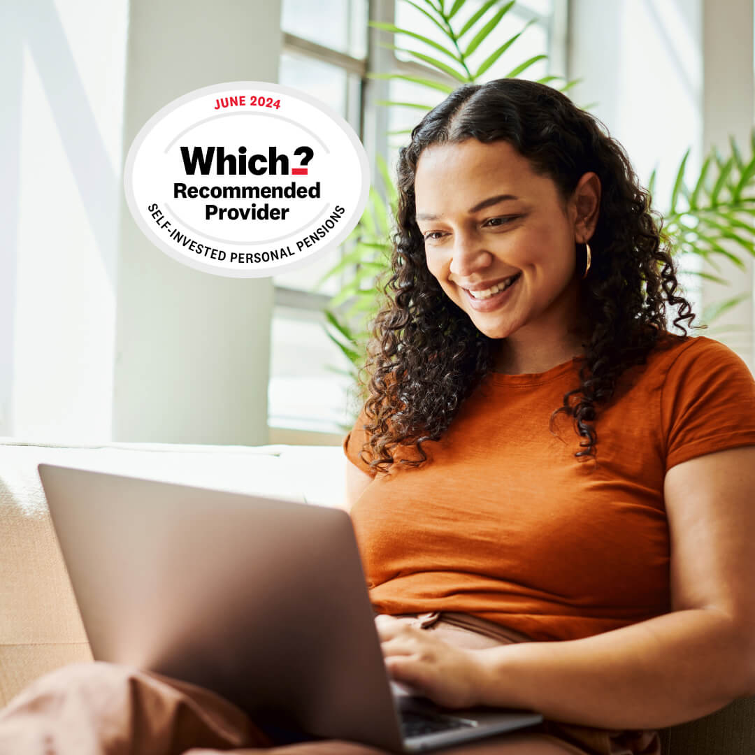 Young woman on laptop - Which Recommended badge