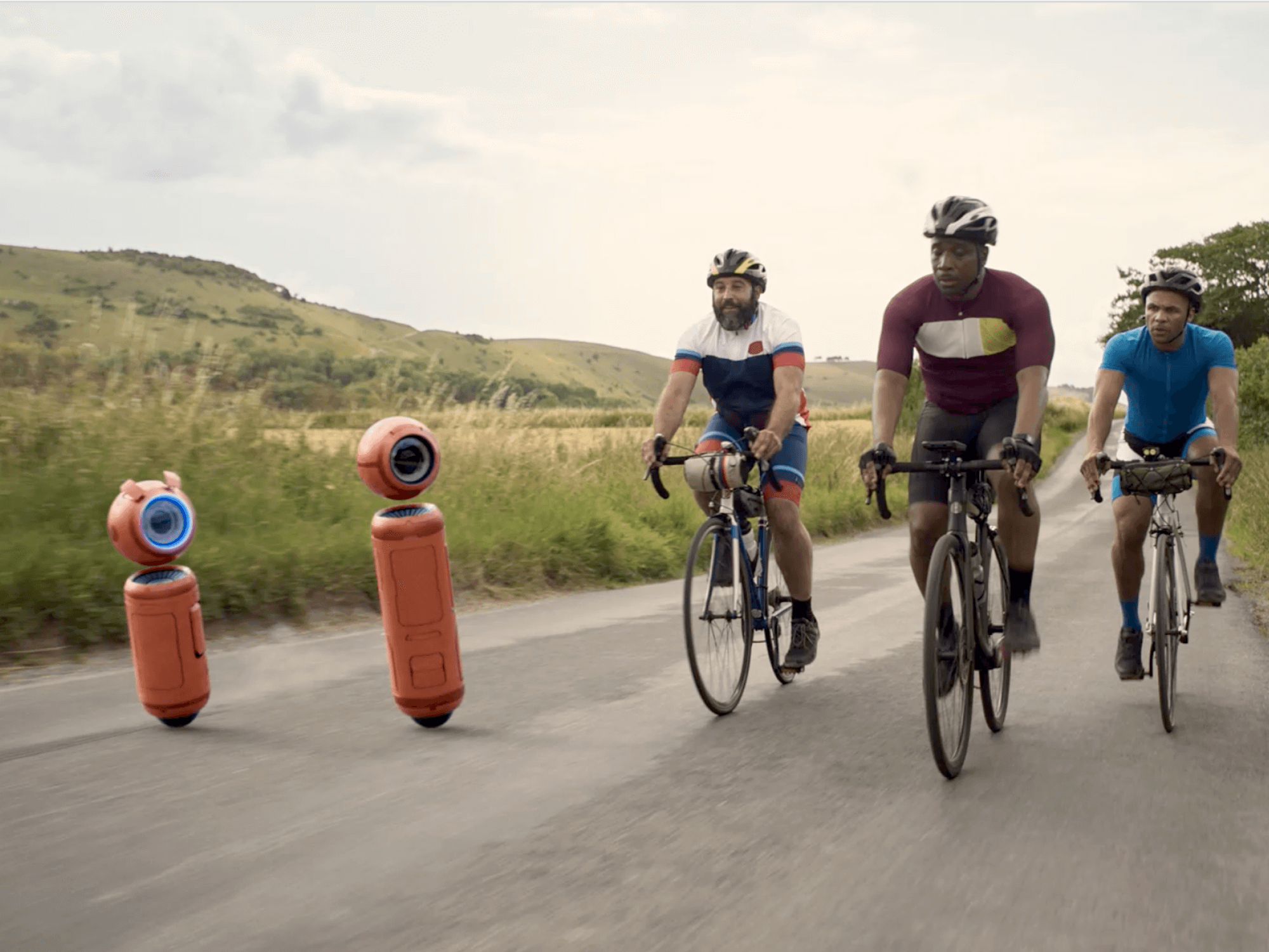 ii Robots with three cyclists on country road brand image